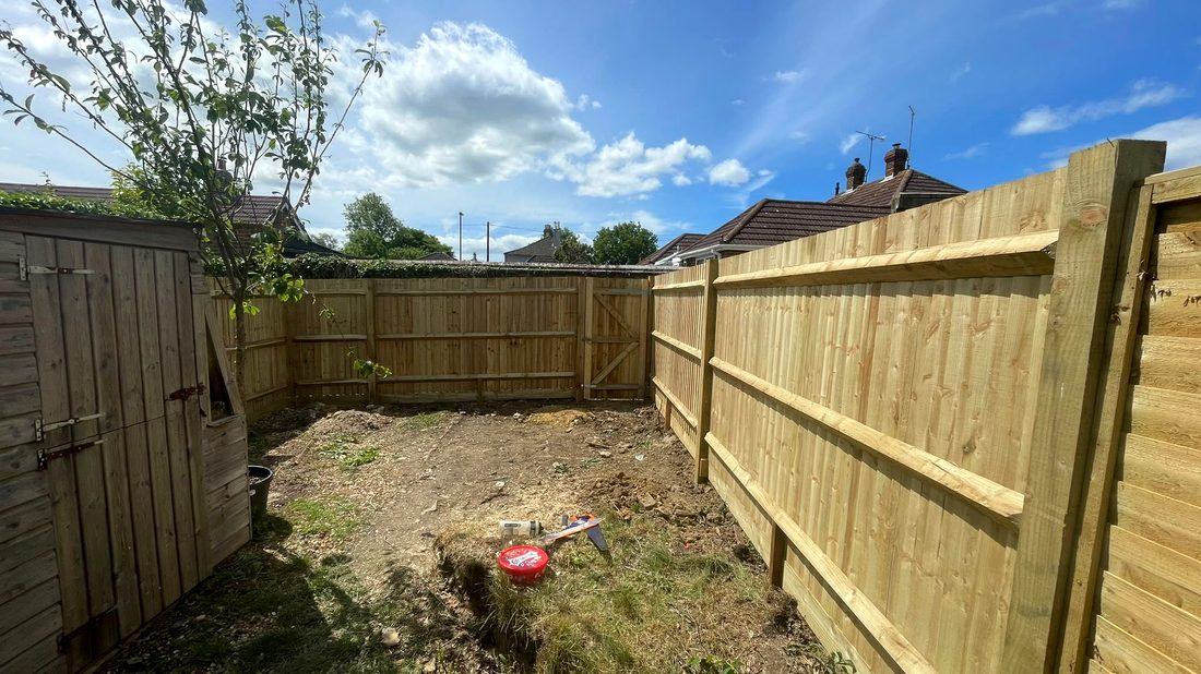 A run of new closeboard timber fencing built by Flint Landscaping