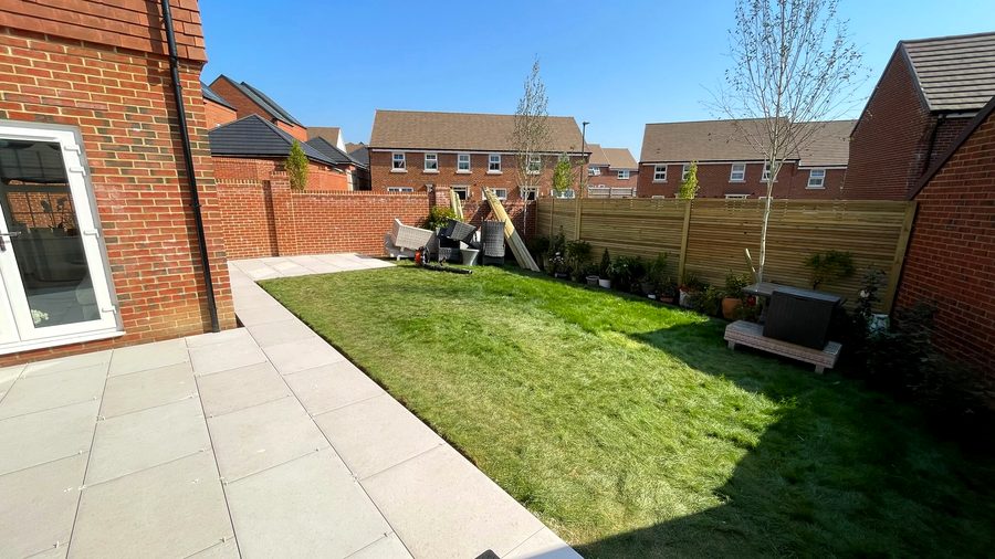 Porcelain patio with a new lawn